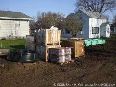 Coils, crates, and pipes on Ash Street, Sauk Centre, Minnesota.