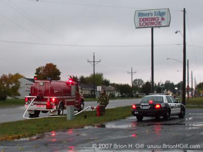 Tanker and police car, after Thursday's storm in Sauk Centre, Minnesota